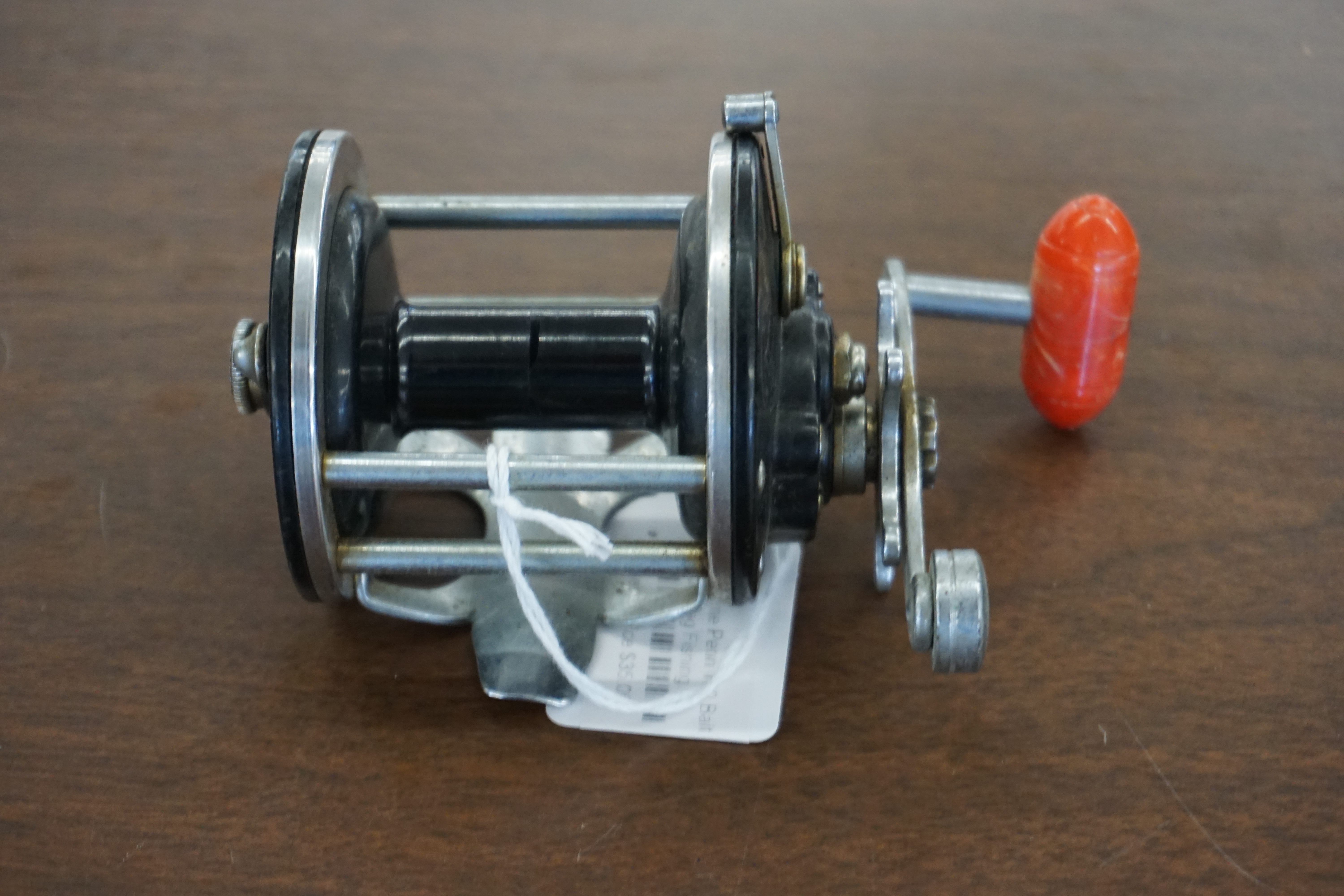 (image for) Penn 100 Bait Caster Red Handle (10049)